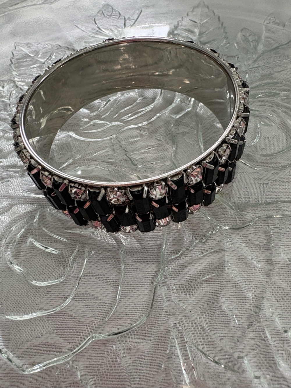 Elegant Silver Bangle Bracelet with Black and Clear Rhinestones.